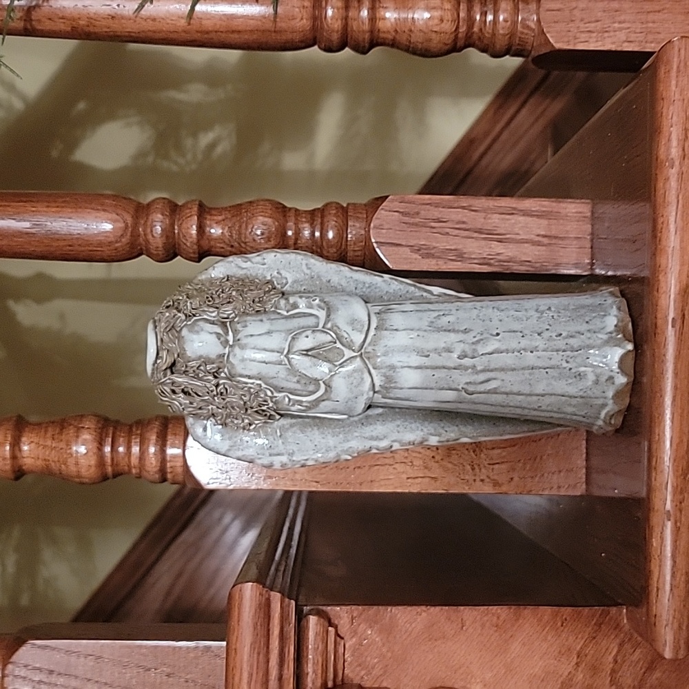 Clay handmade Christmas angel with a halo. Heavy. Signed by artist 1997? Glazed